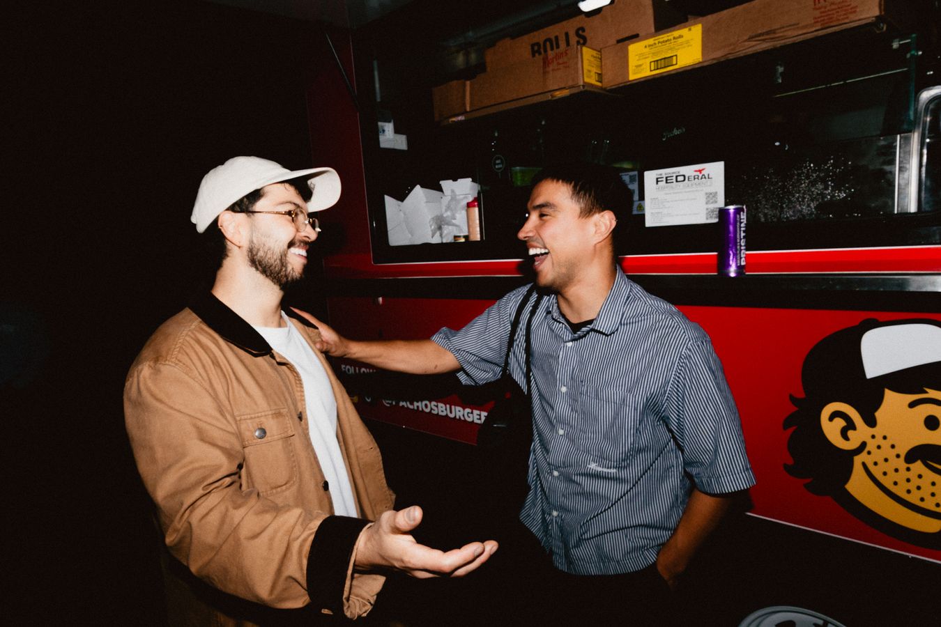 Mates laughing by the truck